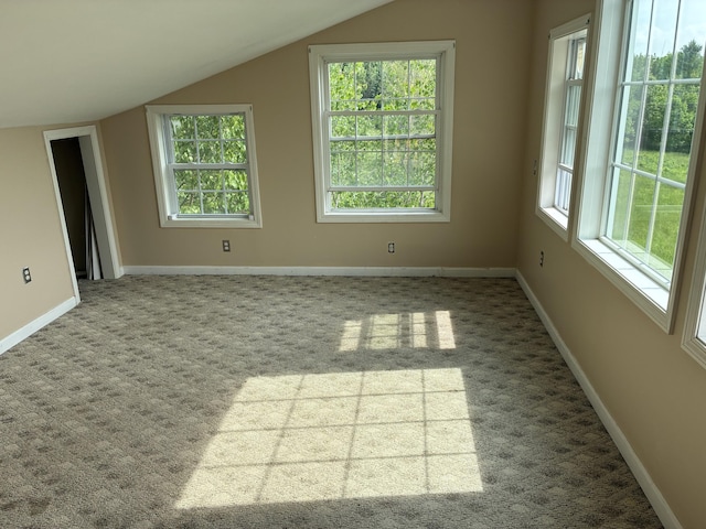 20 Monument Rd, Abbot, ME 04406 - empty room with carpet, lofted ceiling, and baseboards