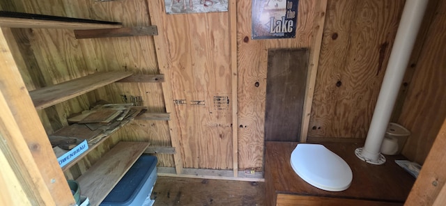 1261 Turkey Tail Rd Unit T4, Indian Purchase Twp, ME 04462 - bathroom with wooden walls and toilet