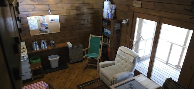 1261 Turkey Tail Rd Unit T4, Indian Purchase Twp, ME 04462 - living area with wood walls and wood-type flooring