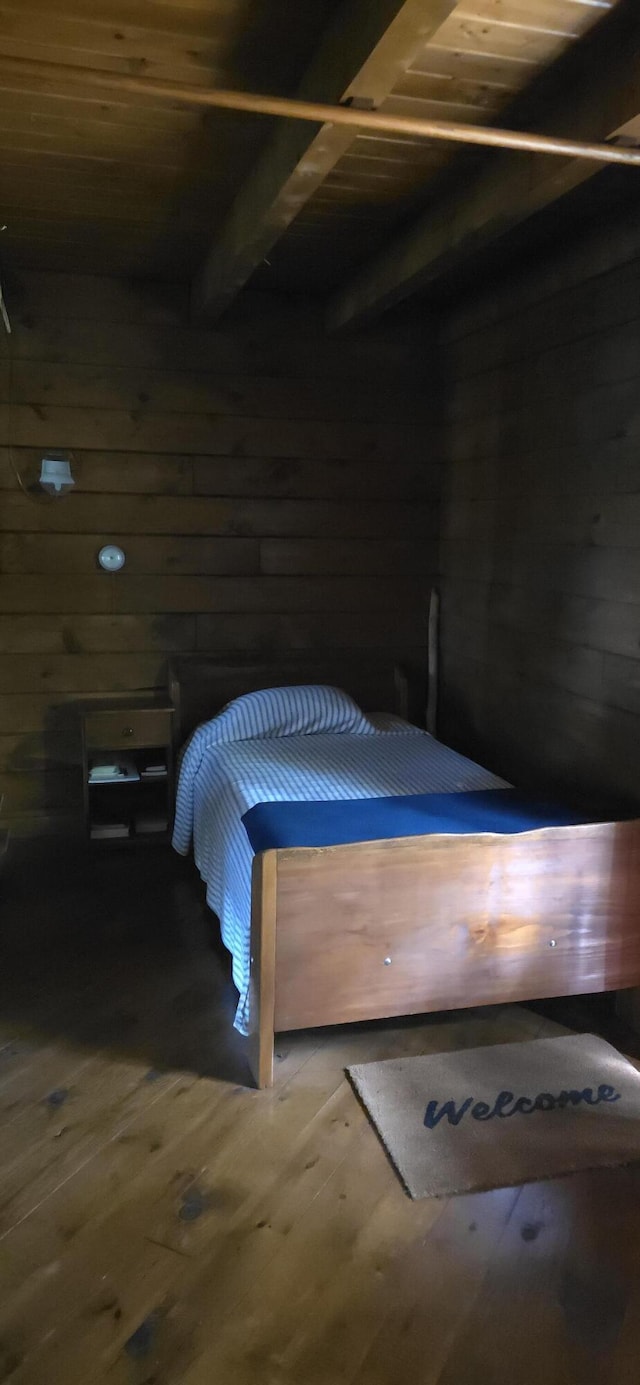 1261 Turkey Tail Rd Unit T4, Indian Purchase Twp, ME 04462 - bedroom featuring wood-type flooring and wooden ceiling with exposed beams
