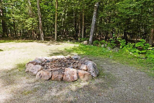 30 Ring Landing Rd, Casco, ME 04015 - view of yard with a wooded view