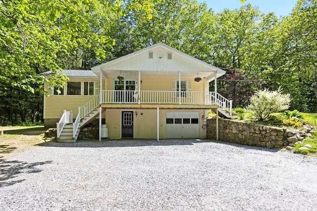 30 Ring Landing Rd, Casco, ME 04015 - view of front of property featuring stairway, driveway, and a garage