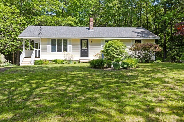 30 Ring Landing Rd, Casco, ME 04015 - single story home with a chimney, a front yard, and roof with shingles