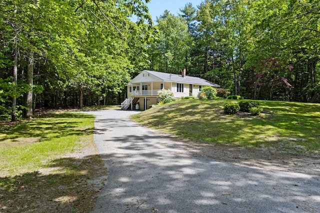 30 Ring Landing Rd, Casco, ME 04015 - ranch-style home featuring asphalt driveway, stairs, a chimney, a carport, and a porch