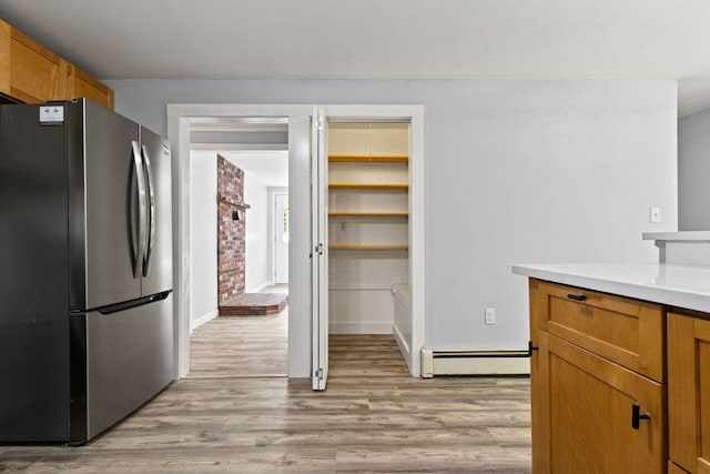 30 Ring Landing Rd, Casco, ME 04015 - storage area featuring a baseboard radiator