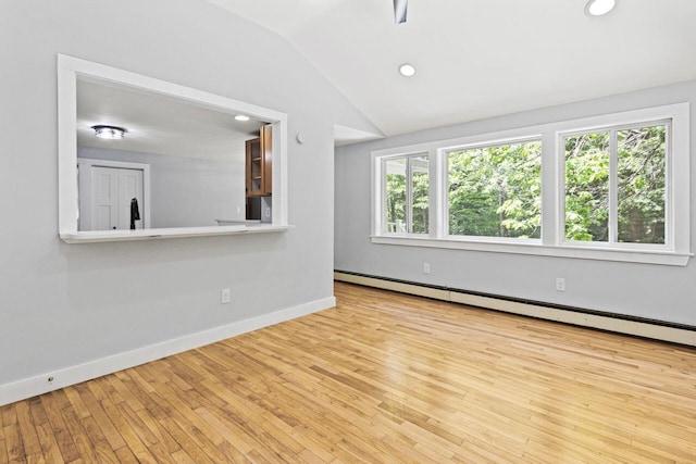 30 Ring Landing Rd, Casco, ME 04015 - unfurnished living room with lofted ceiling, hardwood / wood-style flooring, baseboards, recessed lighting, and baseboard heating