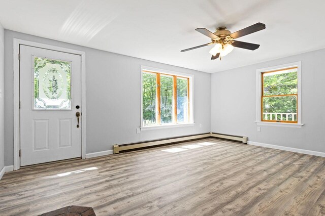 30 Ring Landing Rd, Casco, ME 04015 - entrance foyer with healthy amount of natural light, wood finished floors, and baseboards