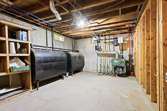 30 Ring Landing Rd, Casco, ME 04015 - basement with heating fuel and a heating unit