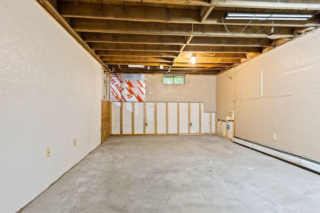 30 Ring Landing Rd, Casco, ME 04015 - below grade area featuring a baseboard heating unit