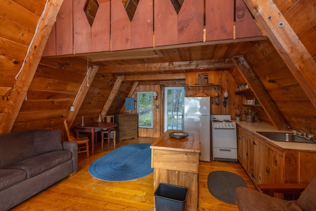 74 Snow Village Rd, Liberty, ME 04949 - living area with wood ceiling, light wood finished floors, and wooden walls