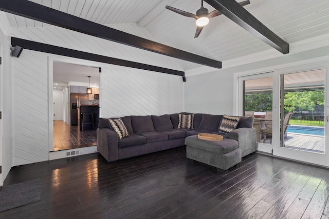 18 Tibbetts Ln, Lyman, ME 04002 - living room featuring hardwood / wood-style flooring, ceiling fan, and wooden walls