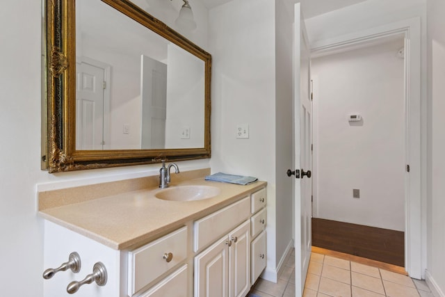 18 Tibbetts Ln, Lyman, ME 04002 - bathroom featuring vanity, tile patterned floors, and baseboards