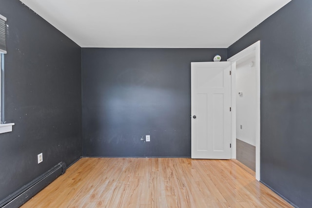 18 Tibbetts Ln, Lyman, ME 04002 - unfurnished room with baseboard heating and wood finished floors