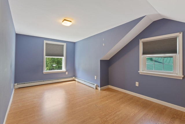 18 Tibbetts Ln, Lyman, ME 04002 - additional living space featuring wood finished floors, lofted ceiling, a baseboard heating unit, and baseboards