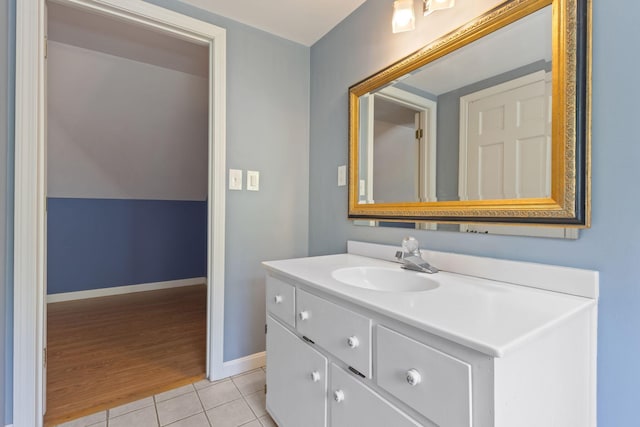18 Tibbetts Ln, Lyman, ME 04002 - bathroom featuring vanity, tile patterned floors, and baseboards