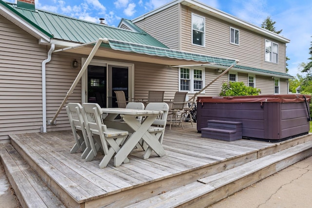 18 Tibbetts Ln, Lyman, ME 04002 - deck featuring a hot tub and outdoor dining space