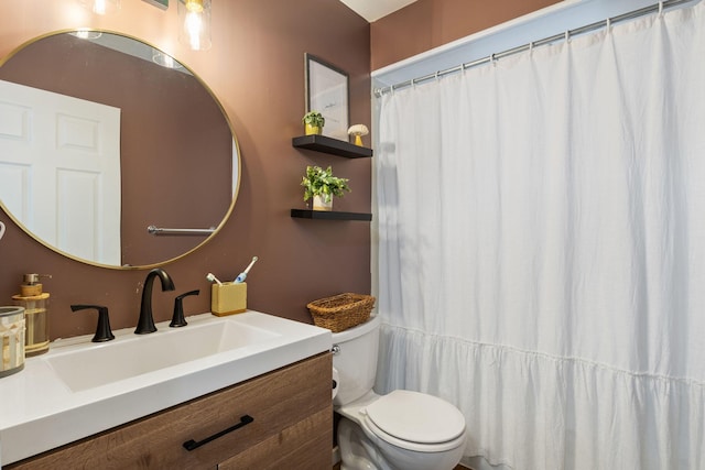 1 Fair St, Lewiston, ME 04240 - bathroom featuring toilet and vanity