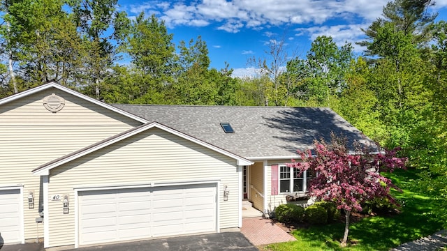 40 Camden Ct Unit 40, Bangor, ME 04401 - view of front of house with a shingled roof and driveway
