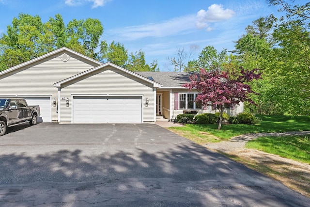 40 Camden Ct Unit 40, Bangor, ME 04401 - ranch-style home featuring a garage, driveway, and a front yard