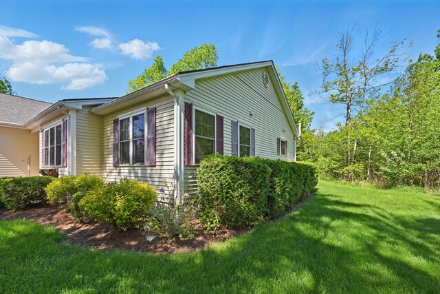 40 Camden Ct Unit 40, Bangor, ME 04401 - view of side of home with a yard