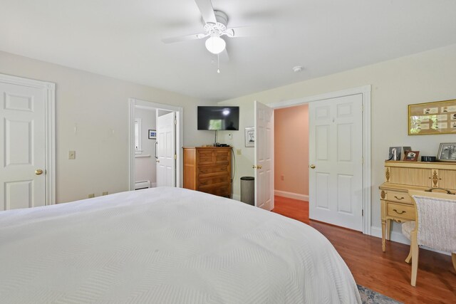 40 Camden Ct Unit 40, Bangor, ME 04401 - bedroom featuring wood finished floors, ceiling fan, connected bathroom, and baseboards