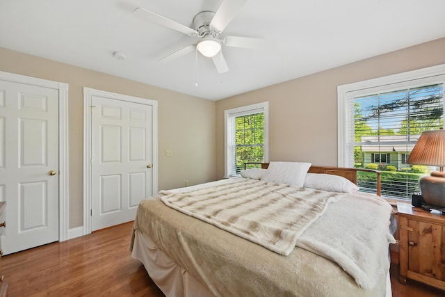 40 Camden Ct Unit 40, Bangor, ME 04401 - bedroom with wood finished floors and a ceiling fan