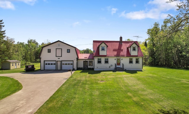 87 Southard Ave, Kenduskeag, ME 04450 - dutch colonial with a chimney, metal roof, a gambrel roof, driveway, and entry steps