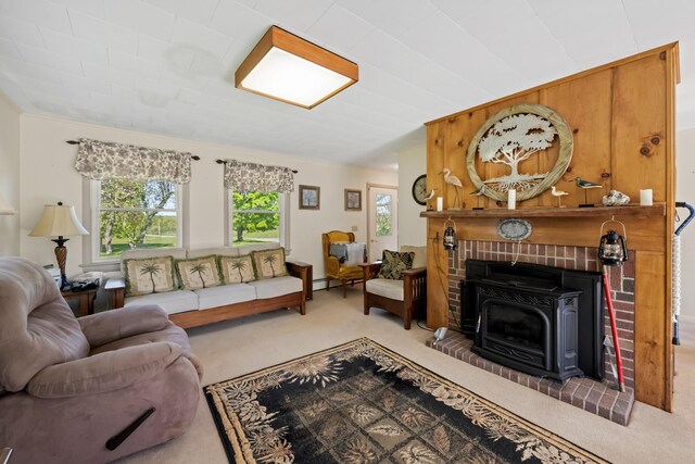 87 Southard Ave, Kenduskeag, ME 04450 - carpeted living room featuring a baseboard radiator