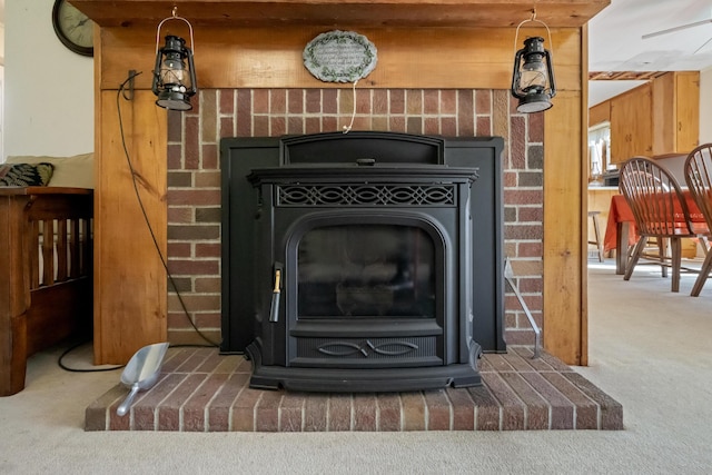 87 Southard Ave, Kenduskeag, ME 04450 - detailed view of a wood stove and carpet