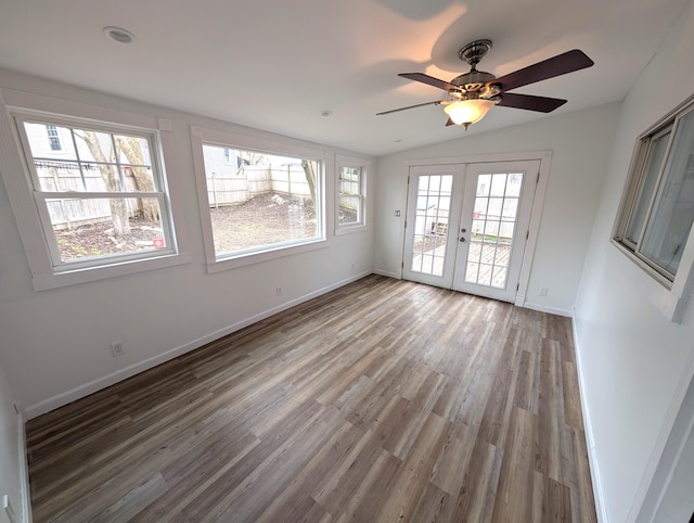 195 Elm St, Biddeford, ME 04005 - interior space featuring french doors, wood finished floors, baseboards, lofted ceiling, and ceiling fan