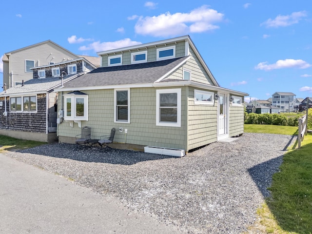 75 Ox Cart Ln Unit 2, Wells, ME 04090 - view of front facade featuring roof with shingles