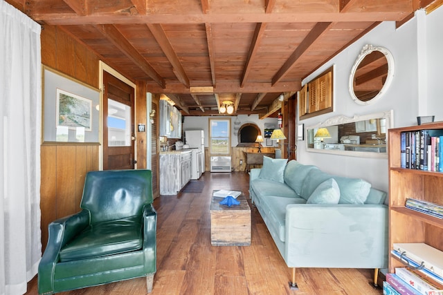 75 Ox Cart Ln Unit 2, Wells, ME 04090 - living area with wood finished floors and wooden ceiling with exposed beams