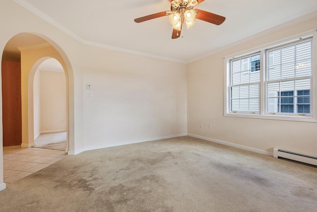 22 Joseph Dr Unit 6, Gorham, ME 04038 - tiled spare room featuring carpet flooring, ornamental molding, baseboard heating, arched walkways, and ceiling fan