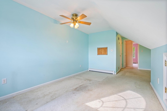 22 Joseph Dr Unit 6, Gorham, ME 04038 - additional living space with a baseboard radiator, vaulted ceiling, light carpet, and a ceiling fan