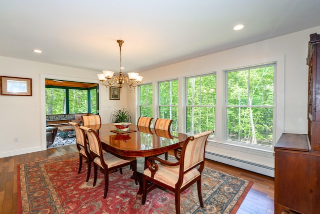 10 Pemasong Ln, Yarmouth, ME 04096 - dining room featuring a baseboard heating unit, dark wood-style floors, a chandelier, recessed lighting, and baseboards