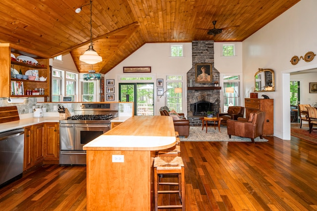 10 Pemasong Ln, Yarmouth, ME 04096 - kitchen featuring stainless steel appliances, high vaulted ceiling, dark wood finished floors, wooden ceiling, and a fireplace