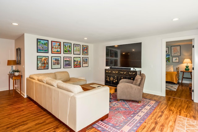 10 Pemasong Ln, Yarmouth, ME 04096 - living room with wood finished floors, baseboards, and recessed lighting