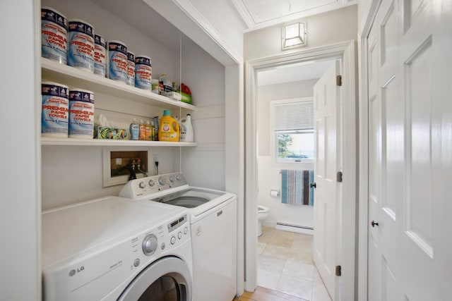 142 Fortunes Rocks Rd, Biddeford, ME 04005 - laundry room featuring a baseboard radiator, washer and dryer, attic access, and light tile patterned flooring