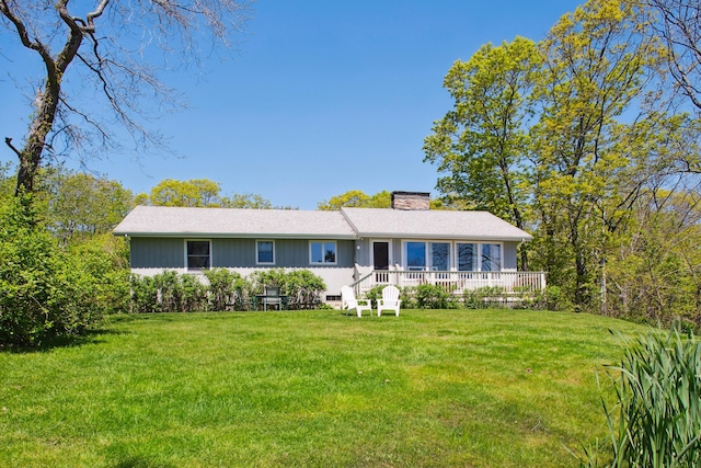 142 Fortunes Rocks Rd, Biddeford, ME 04005 - single story home featuring a chimney and a front lawn