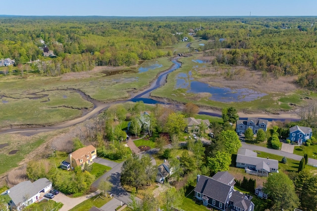 21 Surf Ln, Kennebunk, ME 04043 - aerial view of property's location with a heavily wooded area and a large body of water