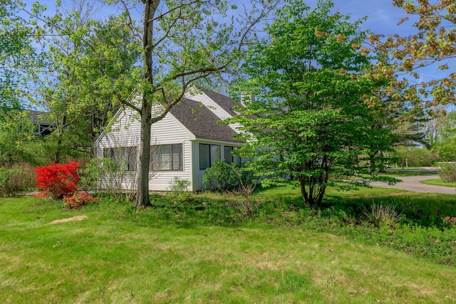 21 Surf Ln, Kennebunk, ME 04043 - view of home's exterior with a lawn