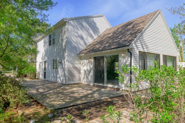 21 Surf Ln, Kennebunk, ME 04043 - back of property with roof with shingles