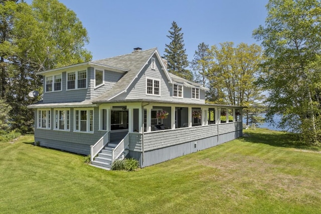 1 Mouse Is, Southport, ME 04576 - rear view of house with a yard and a water view