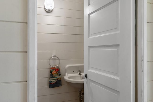 1 Mouse Is, Southport, ME 04576 - bathroom featuring a sink and wooden walls
