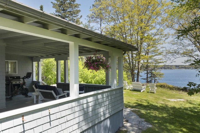 1 Mouse Is, Southport, ME 04576 - view of patio featuring a water view, a grill, and outdoor lounge area