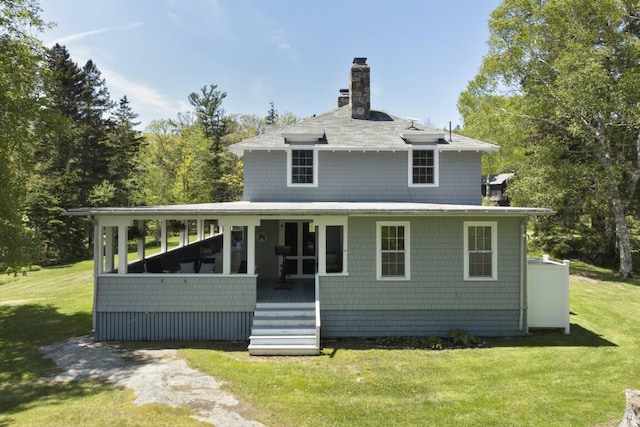 1 Mouse Is, Southport, ME 04576 - rear view of property with a chimney and a lawn