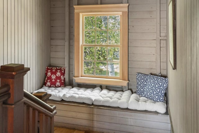 1 Mouse Is, Southport, ME 04576 - living area with wood walls and healthy amount of natural light