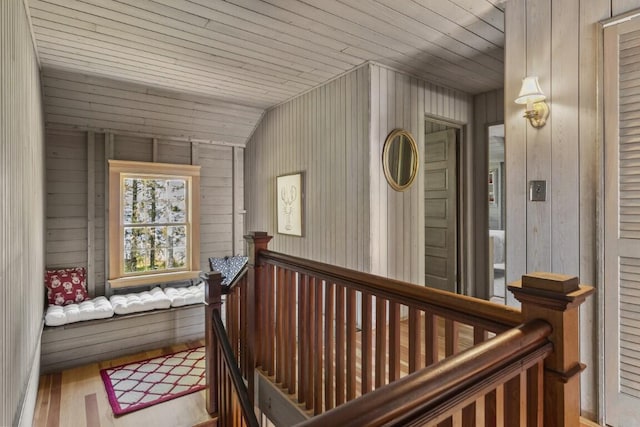 1 Mouse Is, Southport, ME 04576 - hallway featuring an upstairs landing, wood finished floors, wood walls, and wood ceiling