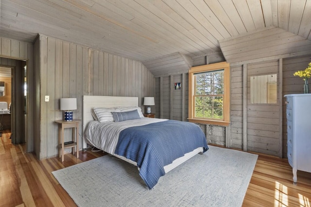 1 Mouse Is, Southport, ME 04576 - bedroom with lofted ceiling, wood walls, wood finished floors, and wooden ceiling
