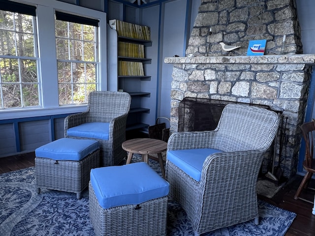 1 Mouse Is, Southport, ME 04576 - sitting room with wood finished floors and a fireplace